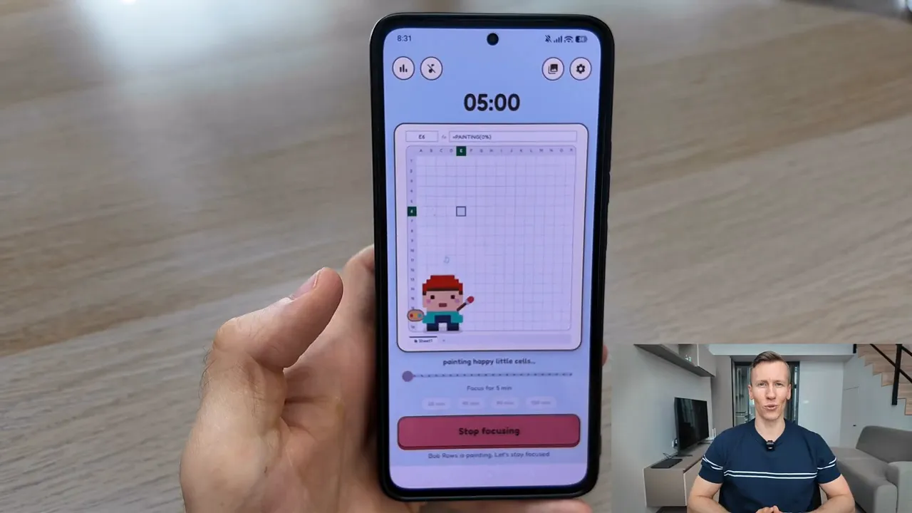 FocusCell app showing a five-minute timer and a pixel artist painting on a spreadsheet grid